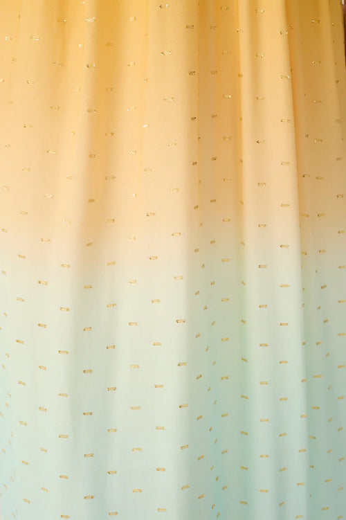 Gradient fabric with small gold details in yellow to blue green