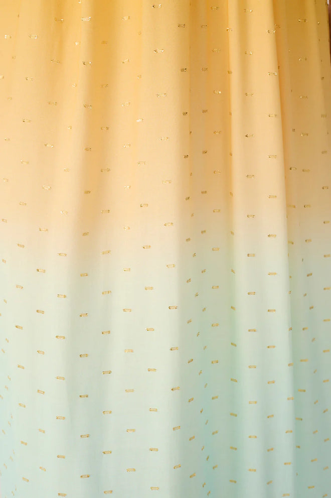 Gradient fabric with small gold details in yellow to blue green