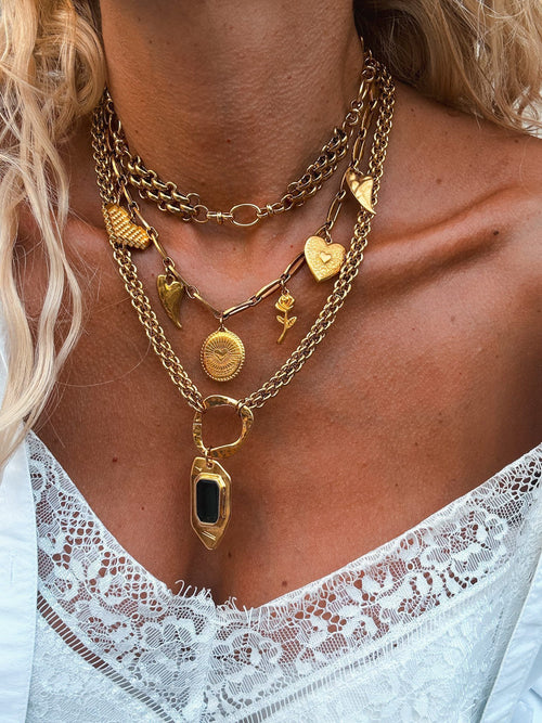 Statement gold charm necklace
