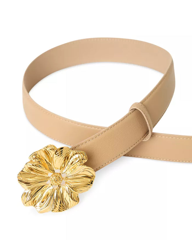 Beige belt with a gold flower-shaped buckle on a white background