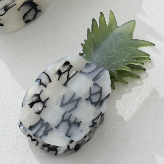 White, black and green pineapple hair clip